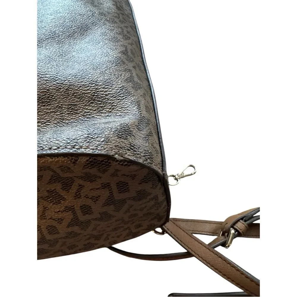 DKNY brown monogram bag is a DKNY Bryant Boston tote featuring an all-over logo